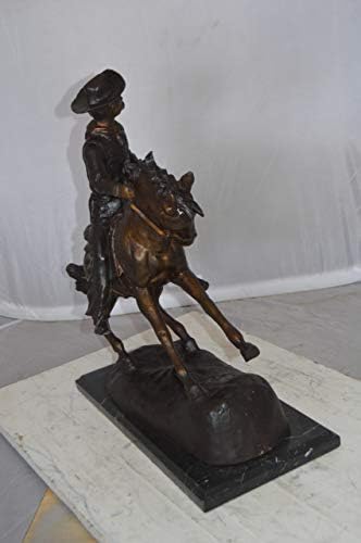 Remington Cowboy Statue 24x9x23 Inches