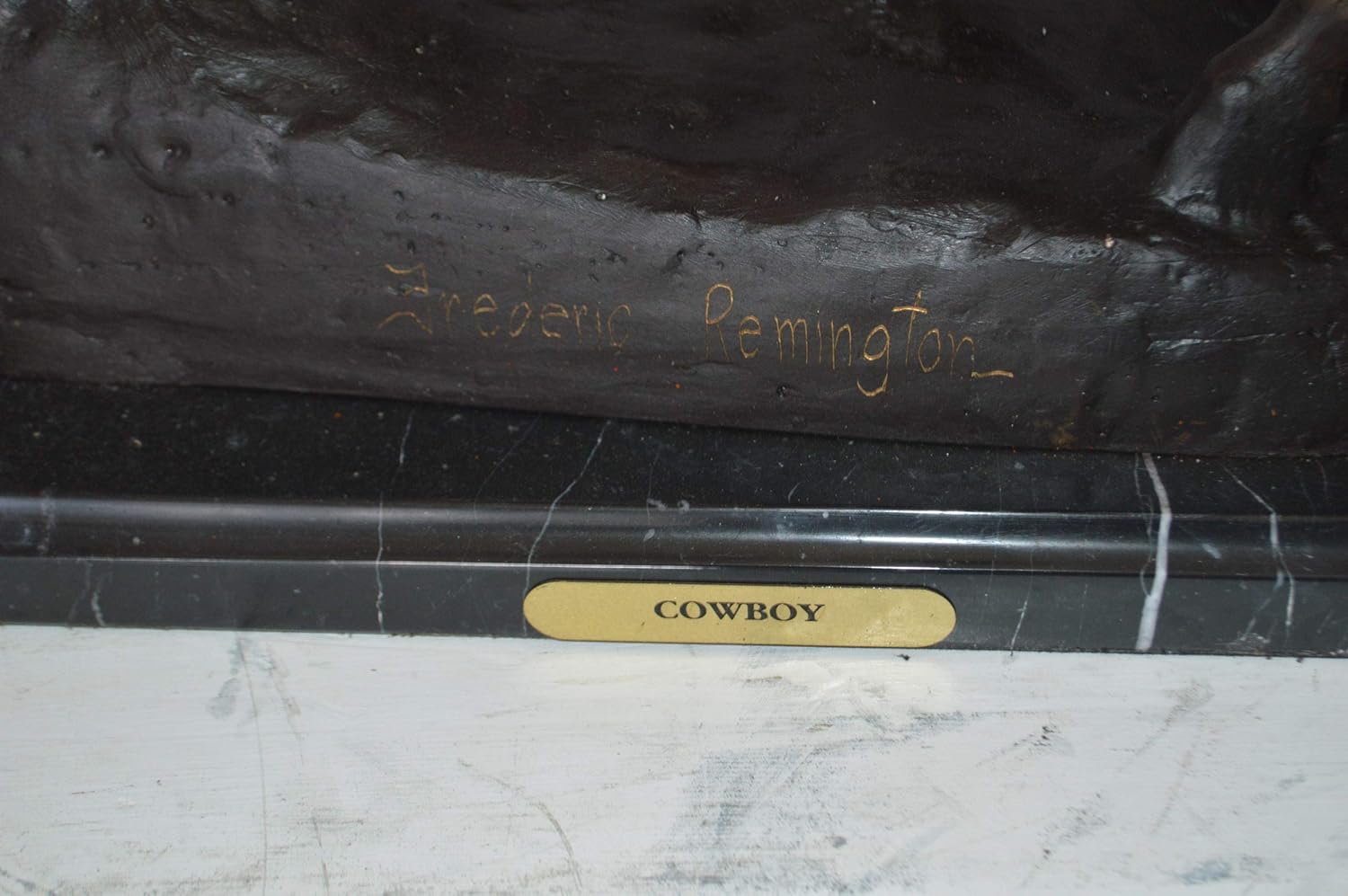 Remington Cowboy Statue 24x9x23 Inches