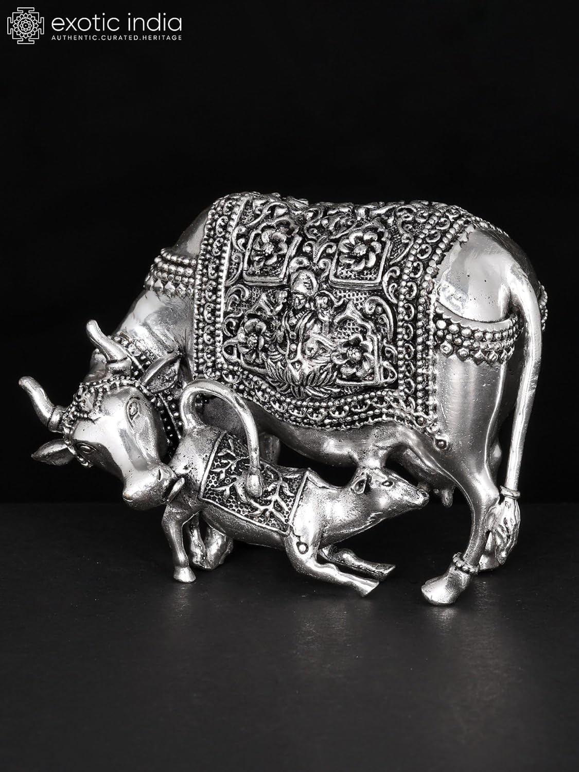 Exotic India Small Superfine Brass Kamdhenu Cow Statue with Lakshmi-Ganesha Carving
